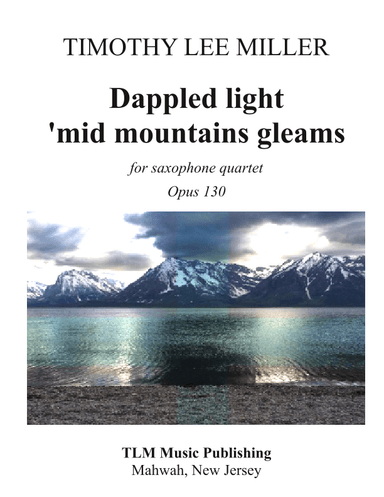 Dappled light 'mid mountains gleams